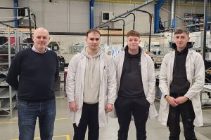 Three of TP Matrix's apprentices with operations manager Ian Entwistle